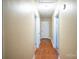 Hallway with hardwood floors and multiple doors at 1332 Midwood Dr, Gastonia, NC 28052