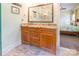 Bathroom vanity with double sinks, granite countertops, and view to the bedroom at 1347 Norman Dr, Rock Hill, SC 29732
