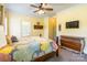 Bedroom with a ceiling fan, en suite bathroom, and a view of a chest of drawers at 1347 Norman Dr, Rock Hill, SC 29732