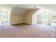 Large bonus room features neutral walls, carpet flooring, and built-in shelving at 1347 Norman Dr, Rock Hill, SC 29732