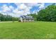 Charming two-story home with a large, inviting porch and well-maintained lawn, perfect for outdoor relaxation at 1347 Norman Dr, Rock Hill, SC 29732