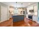 Modern kitchen featuring custom cabinets, stainless steel appliances, and a stylish center island at 1347 Norman Dr, Rock Hill, SC 29732