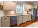 Well-lit kitchen featuring granite countertops, stainless steel appliances, and wood flooring at 1347 Norman Dr, Rock Hill, SC 29732