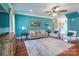 Spacious living room with hardwood floors, stylish decor, and ample seating for entertaining guests at 1347 Norman Dr, Rock Hill, SC 29732