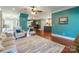 Open-concept living area showcasing hardwood floors, inviting seating, and seamless flow to other living spaces at 1347 Norman Dr, Rock Hill, SC 29732