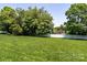 Expansive backyard with lush green lawn and white vinyl privacy fence at 139 Hardwick Dr, Mooresville, NC 28115