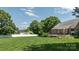 Expansive backyard with a wooden deck and white fence, offering a private outdoor space at 139 Hardwick Dr, Mooresville, NC 28115