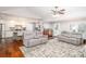 Bright and open-concept living area that features a ceiling fan at 139 Hardwick Dr, Mooresville, NC 28115