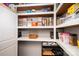 Organized pantry with ample shelving for storing food and kitchen essentials at 139 Hardwick Dr, Mooresville, NC 28115