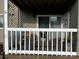 Charming balcony area with white railing and outdoor seating at 140 Lake Concord Ne Rd, Concord, NC 28025