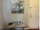Charming entryway featuring a neutral wall, bench with accent pillows, and decorative painting at 140 Lake Concord Ne Rd, Concord, NC 28025