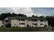 A multi-Gathering condo with private balcony and mature trees creating a park-like setting at 140 Lake Concord Ne Rd, Concord, NC 28025