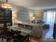 Cozy living room with dining area, modern furnishings, and ample natural light at 140 Lake Concord Ne Rd, Concord, NC 28025