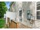 Townhome back deck with wooden railing and access to the backyard at 14664 Lions Paw St, Charlotte, NC 28273