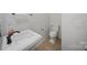 Small bathroom featuring a pedestal sink, toilet, and tile floors at 14664 Lions Paw St, Charlotte, NC 28273