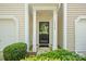 An up close view of a black front door surrounded by white pillars at 14664 Lions Paw St, Charlotte, NC 28273
