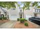 Charming townhouse with well-maintained landscaping and a single-car garage at 14664 Lions Paw St, Charlotte, NC 28273