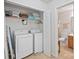 Laundry area with washer, dryer, and shelves for storage at 14664 Lions Paw St, Charlotte, NC 28273