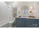 Charming bathroom with a modern gray vanity, marble countertops, and stylish fixtures at 159 Carsons Pl, Mooresville, NC 28117