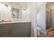 Bright bathroom featuring a modern vanity, and glass-enclosed shower at 159 Carsons Pl, Mooresville, NC 28117