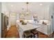 Elegant kitchen with marble countertops, stainless steel appliances, and a large island, creating a luxurious cooking space at 159 Carsons Pl, Mooresville, NC 28117