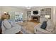 Cozy living room with a brick fireplace, built-in shelving, and comfortable seating with a decorative rug at 159 Carsons Pl, Mooresville, NC 28117