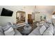 Comfortable sunroom with ample seating, natural light, and access to other living areas at 159 Carsons Pl, Mooresville, NC 28117