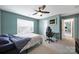 Bedroom with a ceiling fan, carpet, and a desk set by the window at 1604 Trentwood Dr, Fort Mill, SC 29715