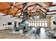 Beautiful clubhouse boasts soaring ceilings, a fireplace, rocking chairs, and ample seating at 1604 Trentwood Dr, Fort Mill, SC 29715