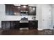 Well-equipped kitchen with stainless steel range, microwave, and ample counter space at 1604 Trentwood Dr, Fort Mill, SC 29715