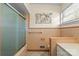 Retro bathroom featuring a shower, tile accents, and vintage-inspired vanity at 1627 33Rd Ne Ave, Hickory, NC 28601