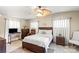 Comfortable bedroom with tile floors, a ceiling fan, and neutral decor at 1627 33Rd Ne Ave, Hickory, NC 28601