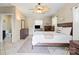 Serene bedroom with natural light, ceiling fan, tiled floors and a neutral color scheme at 1627 33Rd Ne Ave, Hickory, NC 28601