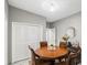 Warm dining room with wooden table and chairs, chandelier, and built-in storage at 1627 33Rd Ne Ave, Hickory, NC 28601