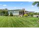 Charming single-story home with a well-manicured lawn, established landscaping, and a welcoming covered carport at 1627 33Rd Ne Ave, Hickory, NC 28601