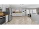 Bright kitchen with stainless steel appliances, white cabinetry, and open floor plan at 1627 33Rd Ne Ave, Hickory, NC 28601