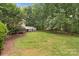 Large backyard with deck at 165 Futrell Lndg, New London, NC 28127