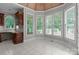 Sun-drenched breakfast nook featuring custom cabinets and windows for a perfect casual dining space at 165 Futrell Lndg, New London, NC 28127