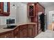 Kitchen area showcasing custom cabinetry, modern built-in appliances, and convenient countertop space at 165 Futrell Lndg, New London, NC 28127