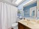 Cozy bathroom with a vanity, toilet and shower with white curtain at 1670 Robins Nest Ct # D, Gastonia, NC 28054