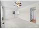 Spacious bedroom featuring neutral walls, plush carpeting, and two entry doors for easy access at 1670 Robins Nest Ct # D, Gastonia, NC 28054