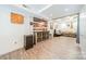 Finished basement with a unique bar area, offering a stylish and versatile space for gatherings at 2332 Hemby Pl, Charlotte, NC 28270