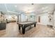 Spacious basement featuring a pool table and ample room for entertainment and recreation at 2332 Hemby Pl, Charlotte, NC 28270