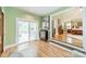 Sitting area featuring a sliding door to a deck with an interior bedroom view at 2332 Hemby Pl, Charlotte, NC 28270