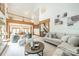 Open-concept living space with a fireplace, lots of room, and high ceilings at 2332 Hemby Pl, Charlotte, NC 28270