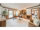 Bright office with built-in bookshelves, ample natural light, and neutral carpet at 2332 Hemby Pl, Charlotte, NC 28270