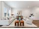 Airy living room featuring modern decor, hardwood floors, and ample seating at 2600 Mason Cir # A, Charlotte, NC 28205