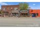 Street view with an assortment of shops, including tattoo parlor and jewelry store at 2600 Mason Cir # A, Charlotte, NC 28205