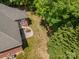 Aerial view of the property with a patio, outdoor furniture, and lush green landscape at 2804 Pulaski Dr, Monroe, NC 28110