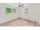 Clean bedroom with a ceiling fan and plenty of windows at 306 2Nd Avenue Ne Pl, Conover, NC 28613